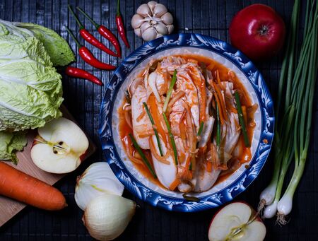Kimchi in a bowl and background is a component of makingの写真素材