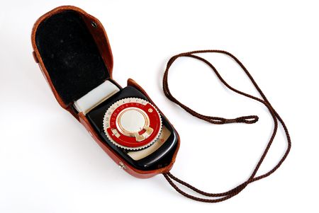 Vintage light meter in a leather case on a small strapの写真素材