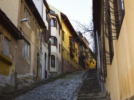 Old steep cobblestone streets and houseの写真素材