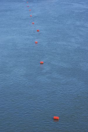 Bouys in the blue water.の写真素材