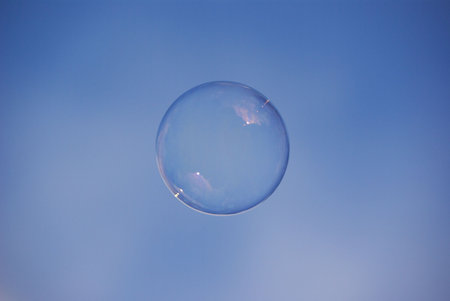 Soap bubble on the sky background.