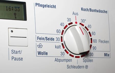 Washing machine - start button and temerature dialの写真素材