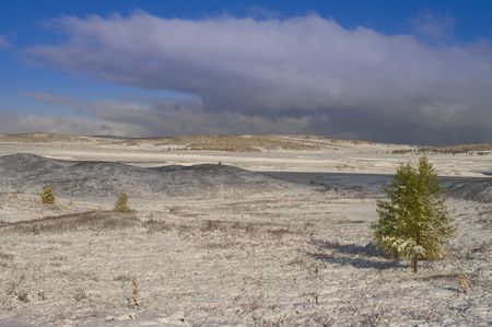 Cloudy winter high-mountain tundra landscapeの写真素材