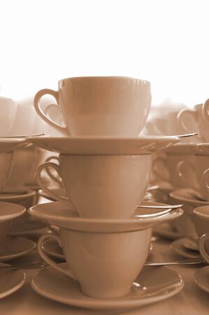 A lot of stacks with empty coffee cups with white backgroundの写真素材