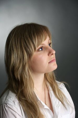 Portrait of long hair attractive young womanの写真素材