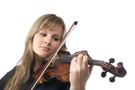 Cute young violinist playing violin over white backgroundの写真素材