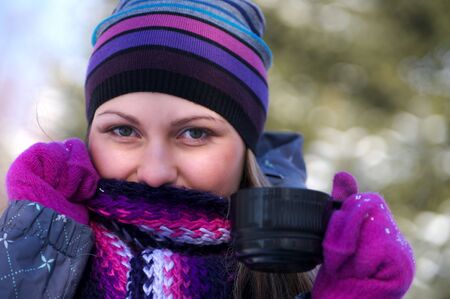 Closeup portrait of beautiful girl in winter clothesの写真素材