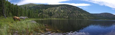 Panoramic view of beautiful mountain lakeの写真素材