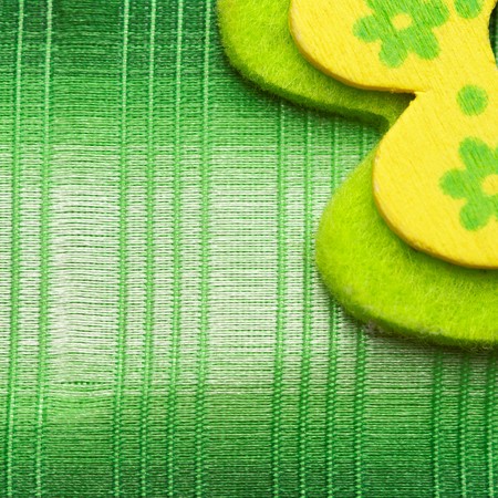 Closeup green fabric texture background with some decorationの写真素材