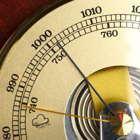 Old barometer forecasting stormy weather の写真素材
