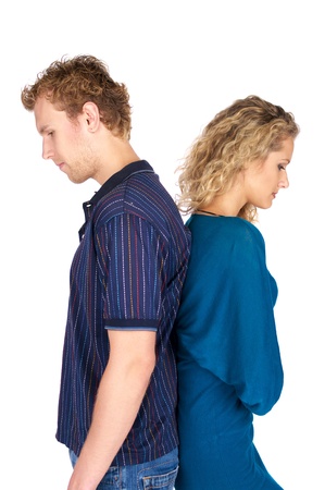 Pensive couple having an argument isolated over white backgroundの写真素材