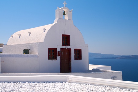 Beautiful white church in Oia village, Santorini, Greece.の写真素材
