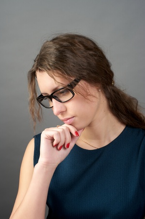 Portrait of pensive businesswoman looking upの写真素材