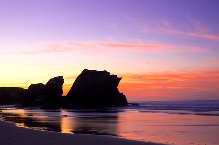 Beautiful sunset on the Atlantic ocean beach of the cathedrals, Spain.の写真素材