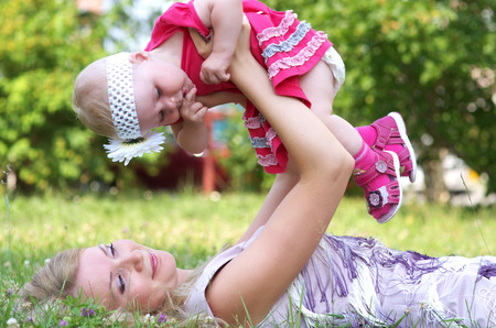 Mother and her child in the parkの写真素材