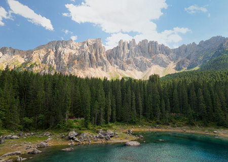 Lake Lago di Carezza in the Italian Dolomites at sunny summer dayの写真素材