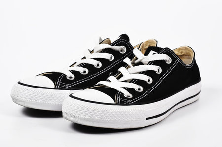 Black canvas shoes on a white background
