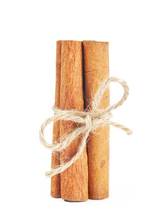 Cinnamon sticks isolated on whiteの写真素材