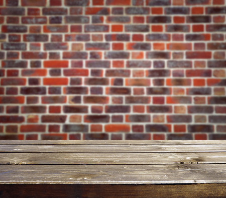 Brickwall with wooden table