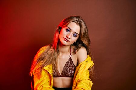 Beauty young woman face portrait. Model girl with perfect fresh clean skin. High fashion model woman in studio, portrait of beautiful sexy woman with trendy make-up and manicure. Skin care concept.の写真素材