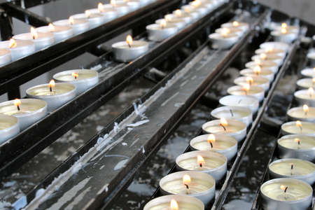 Tealight Candles in churchの写真素材