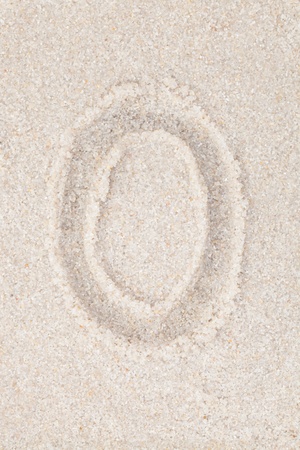 Digits on sand - clean background - 0 - Zeroの写真素材