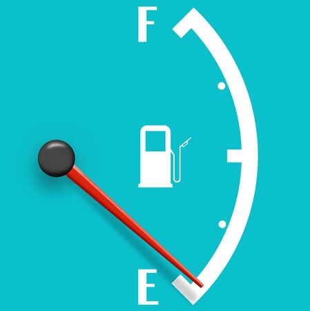 Low fuel sign isolated on a pale blue backgroundの写真素材