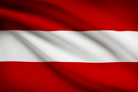 Austrian flag blowing in the wind. Part of a series.の写真素材