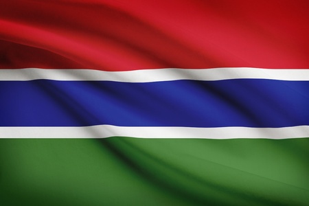Gambian flag blowing in the wind. Part of a series.の写真素材
