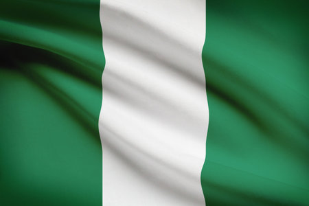 Nigerian flag blowing in the wind. Part of a series.の写真素材