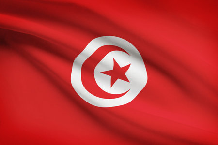 Tunisian flag blowing in the wind. Part of a series.の写真素材