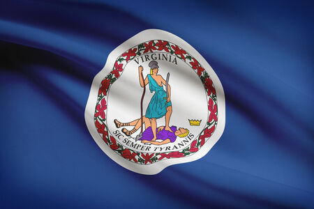 Commonwealth of Virginia flag blowing in the wind. Part of a series.の写真素材
