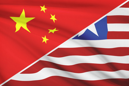 Flags of China and Republic of Liberia blowing in the wind. Part of a series.の写真素材