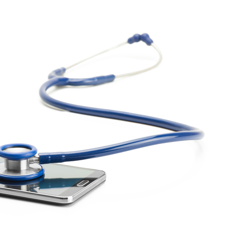 Stethoscope over smartphone screen - studio shoot - 1 to 1 ratioの写真素材
