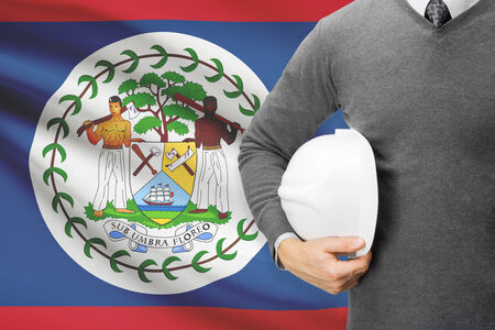 Architect with flag on background  - Belizeの写真素材