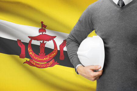 Architect with flag on background  - Bruneiの写真素材
