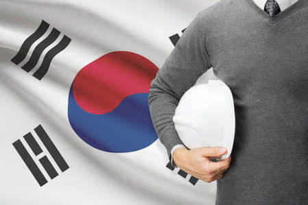 Architect with flag on background  - South Koreaの写真素材