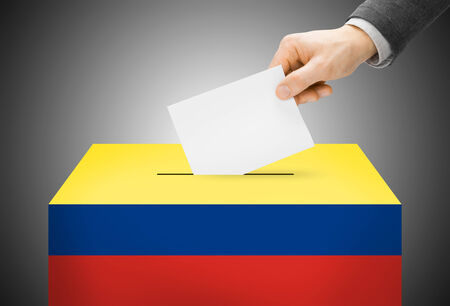 Voting concept - Ballot box painted into Colombia national flagの写真素材