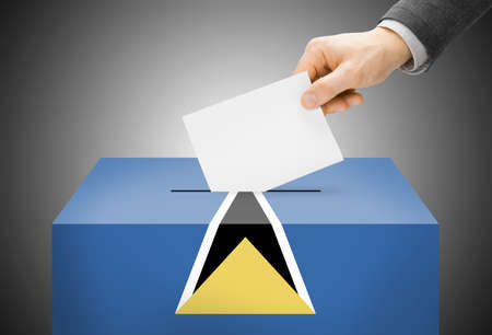 Voting concept - Ballot box painted into Saint Lucia national flagの写真素材