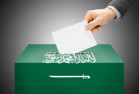 Voting concept - Ballot box painted into Saudi Arabia national flagの写真素材