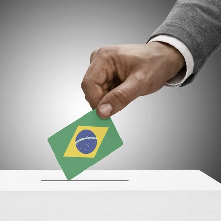 Black male holding Brazil flag. Voting conceptの写真素材