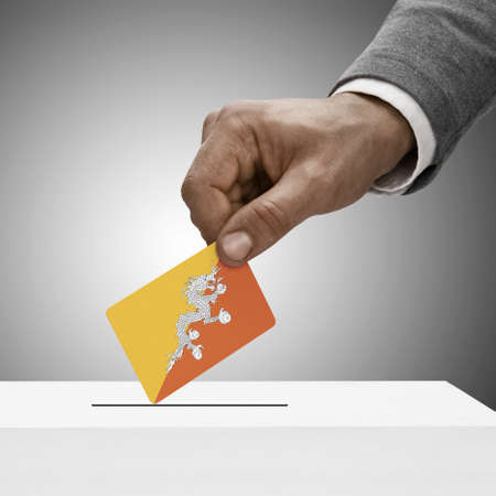 Black male holding Bhutan flag. Voting conceptの写真素材