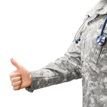 US Army doctor holding thumb up - studio shotの写真素材