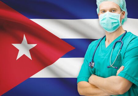 Surgeon with national flag on background - Cubaの写真素材