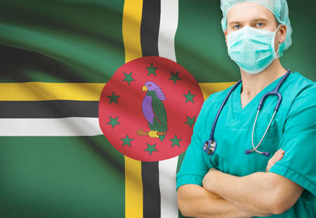 Surgeon with national flag on background - Dominicaの写真素材