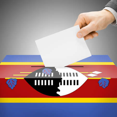 Ballot box painted into Swaziland national flag colorsの写真素材