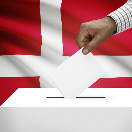 Ballot box with flag on background - Denmarkの写真素材