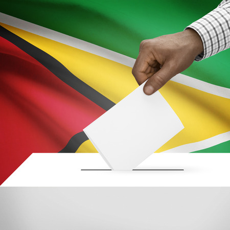 Ballot box with flag on background - Guyanaの写真素材