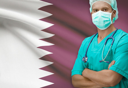 Surgeon with flag on background - Qatarの写真素材