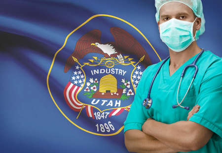Surgeon with USA states flags on background - Utahの写真素材